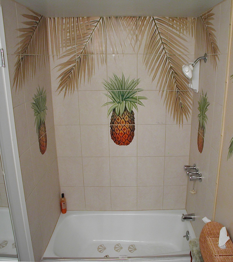 Shower tile mural with pineapple and palm fronds